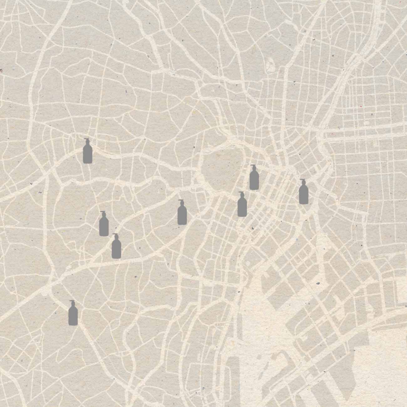City map with Aesop bottles as location markers