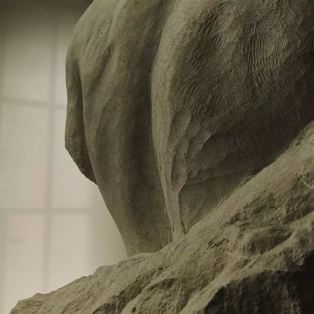 Close-up of a rough stone sculpture with soft window light in the background.