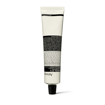 A front view of Parsley Seed Facial Cleansing Masque in an alabaster and black aluminium tube, in perfect shape.