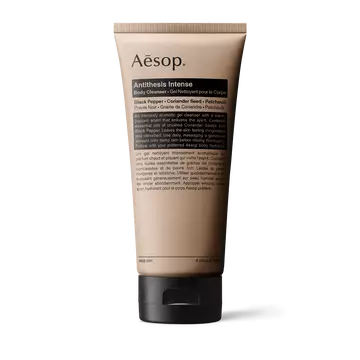 Aesop Antithesis Intense Body Cleanser tube on a light background.